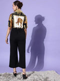 Yellow polyester jumpsuit with animal print collar, three-quarter sleeves, by StyleStone. Model wears XL