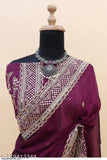 Purple Georgette Bollywood Saree with embellished silk blouse, premium Indian embroidery on display