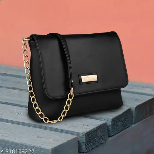 Black faux leather ALSU Women's Sling Bag. 2 compartments, perfect for party wear. High-quality synthetic leather design for modern style