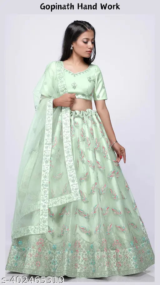 Gopinath hand-work net pista lehenga choli & blouse with embroidered dupatta, free size Indian ethnic wear for women on display