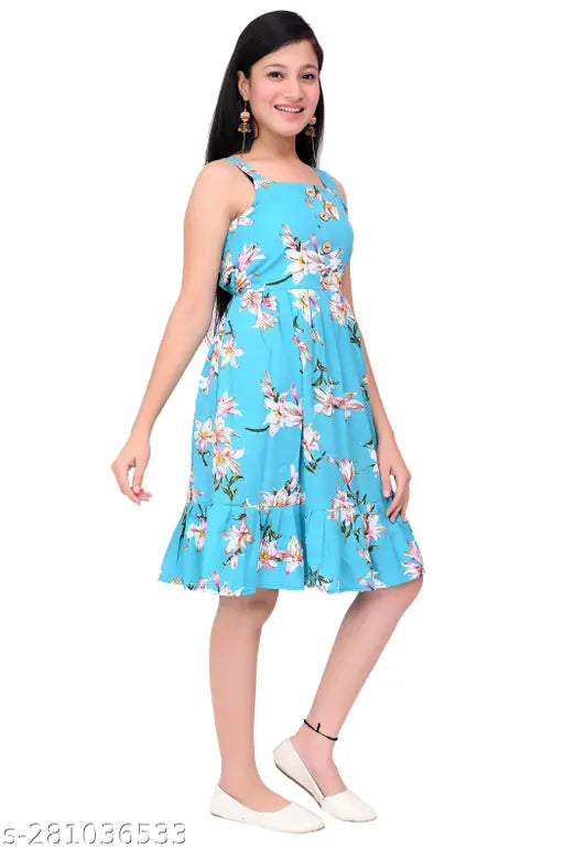 Blue printed floral knee-length kids' dress with belt, ideal for every occasion. Made from soft crepe fabric