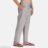 Silver poly blend solid net Women Kurti Pant with double pockets, full elastic waist, and both side pockets. Kurti pant manufactured in India