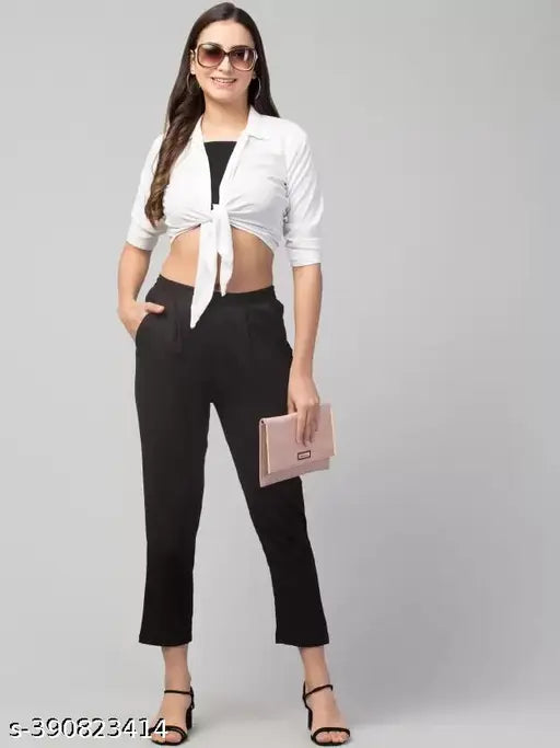 Black cotton blend women's regular fit trousers, sleek and tailored solid-colored design for versatile wear