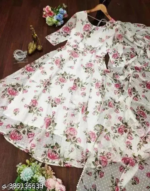 White cotton blend flower print gown with dupatta, three-quarter sleeves, featuring intricate floral pattern. Available in sizes S-XXL. Indian bridal wear on mannequin