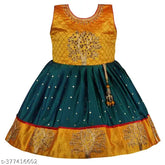 Bottle Green satin frock dress for girls with yellow-green embroidered print and gold details, including waistband and tassel. Indian country of origin