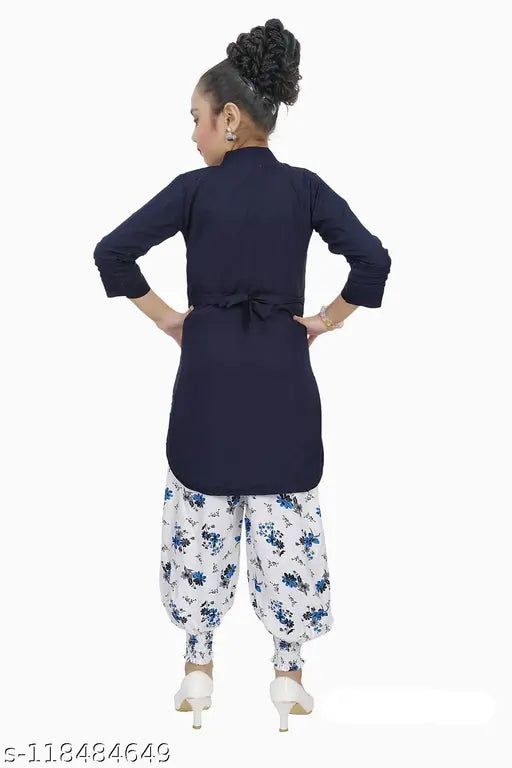 Smarty Girls cotton blend A-line kurta and churidar dhoti set for kids, solid color with three-quarter sleeves, Indian ethnic wear on display