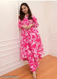 Pink rayon kurti pant set, printed net A-line kurta and straight relaxed palazzos for summer wear, women's ethnic fashion co-ord set on display rack