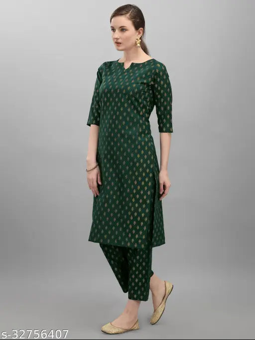 Cotton kurta set for women, three-quarter sleeve palazzos with printed net design - Indian fashion