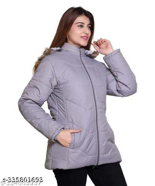 Solid nylon women's jacket with zip closure, long sleeves, and warm winter feel. Made in India