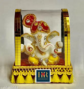 Multi-color polyresin handcrafted Ganesha idol for home decor, ideal for living room and car dashboards. Features antique showpiece design, perfect for gifting or housewarming