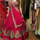 Pink embellished Dulhan Lehenga-Choli set with net fabric and semi-stitch embroidery, featuring a silk satin Choli and 2.5m dupatta. Traditional Indian bridal wear for festivals, parties, and weddings