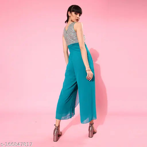 Purple georgette Miss Chase jumpsuit, embellished with turquoise layers, round neck, sleeveless, features two side pockets