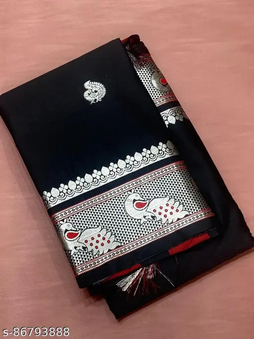 Ikat silk black saree with tassels and blouse, traditional Indian hand-woven design on display