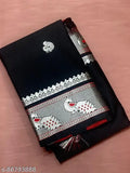 Ikat silk black saree with tassels and blouse, traditional Indian hand-woven design on display