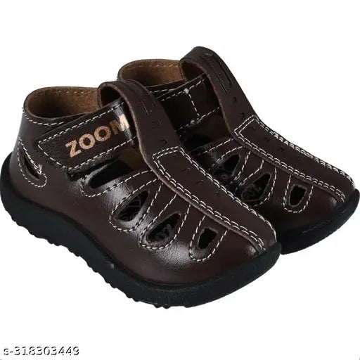 Synthetic leather brown shoe-sandals for kids aged 3 months to 7 years, perfect for parties and casual wear. Adjustable velcro fastening ensures a secure fit