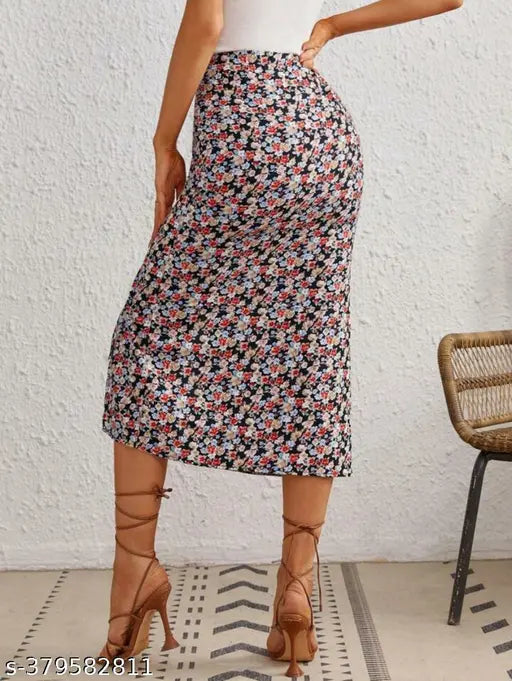 Pencil Foral printed polyester skirt with net pattern, comfortable for everyday wear. Machine washable, fit & flare silhouette. Available in sizes 26, 28, 30, 32 (waist 26/28/30/32, hip 30/32/34/36, length 23/25/25/25). Made in India
