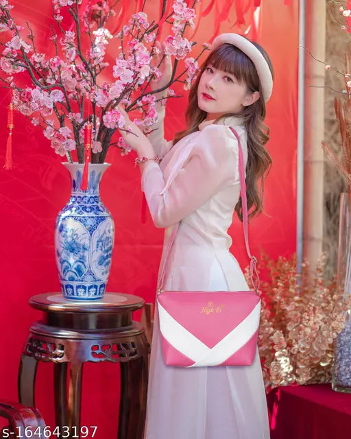 Gold-toned PU slingbag, affordable premium cross-body style for women and girls. Colorblock design with 1 main zip compartment, inner zip pocket, and back side zip pocket. Water-resistant and easy to clean with wet cotton cloth. Perfect for everyday use, parties, or casual events. Made in India