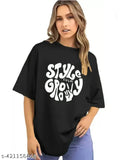 Oversized black cotton blend t-shirt with Stay Groovy print and moon child motif, ideal for casual wear