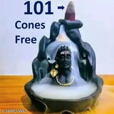 Handcrafted resin Lord Adiyogi Shiv decorative incense holder, features 101 free fragrance backflow incense cones, artfully depicting Shiva meditating beside a smokey waterfall