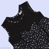 Black polka dotted cotton blend balloon dress with charming bow detail, midi length and round neck, ideal for children's wardrobe (6-12M - 4-5Y)
