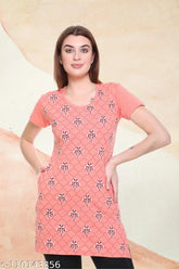 Printed cotton blend longline tunic top with side slits & pockets, ideal for casual summer wear & day to night use. Indian-made, available in various colors and sizes from S-6XL