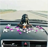Small, black resin Adiyogi Shiva God idol for car dashboard or living room decor. Crescent moon top adds a beautiful touch. Ideal gift for special occasions or home/office decoration. Made by Sculpto Mania in India. Dimensions: 17 cm x 11 cm x 10 cm