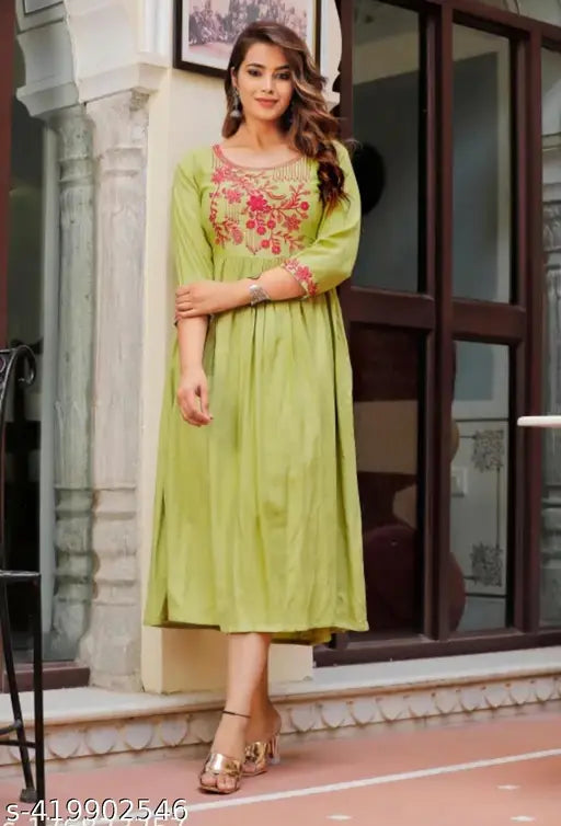 Green rayon gown with embroidered patterns, three-quarter sleeves. S, M, L, XL, XXL, XXXL sizes. Indian made fashion