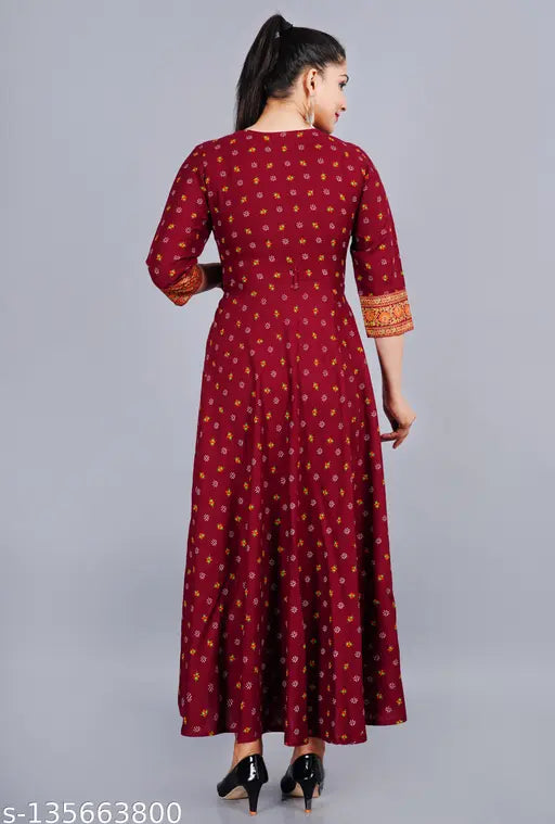 Three-quarter sleeve printed rayon kurti in vibrant Indian motifs, showcasing artisanal ikat technique