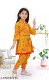 Party wear rayon dress girl with dhoti pants, knee length, three-quarter sleeves. Indian ethnic wear for girls aged 9-10 years, printed design