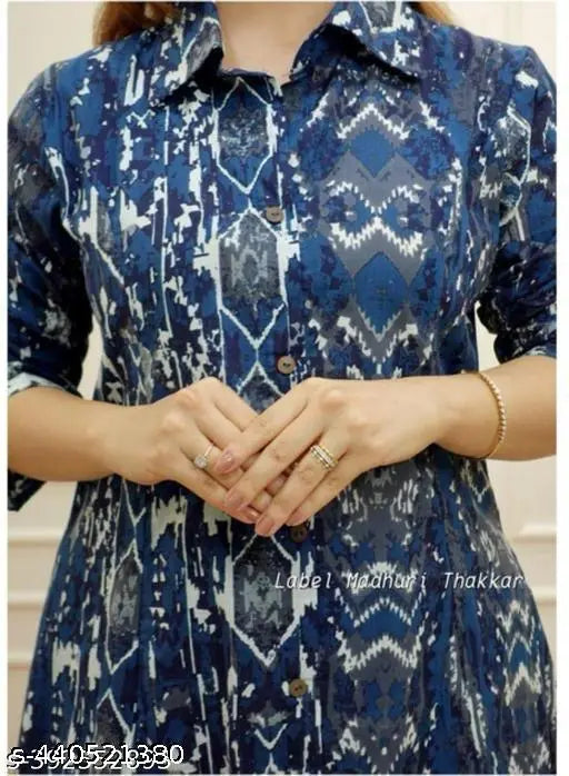 Dull blue print rayon kurta set with palazzos, vibrant pattern on three-quarter sleeves