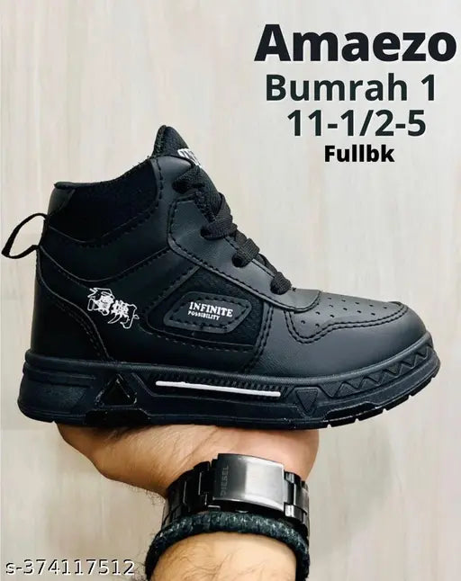 Black mesh BUMRAH 1 boys shoe with lace-up fastening, comfortable padded insole, and printed net pattern - premium quality Indian footwear for kids aged 4-12 years