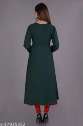 Green rayon embroidered Anarkali ankle length kurta with three-quarter sleeves - Indian ethnic fashion