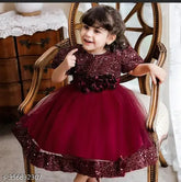 Maroon net embellished baby girl's clothing, perfect for parties or weddings