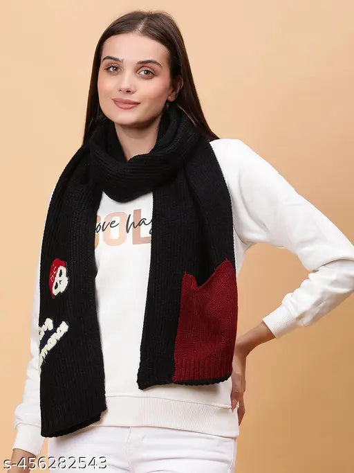 Black wool knitted muffler with embroidered patches, stylish accessory for women's winter fashion