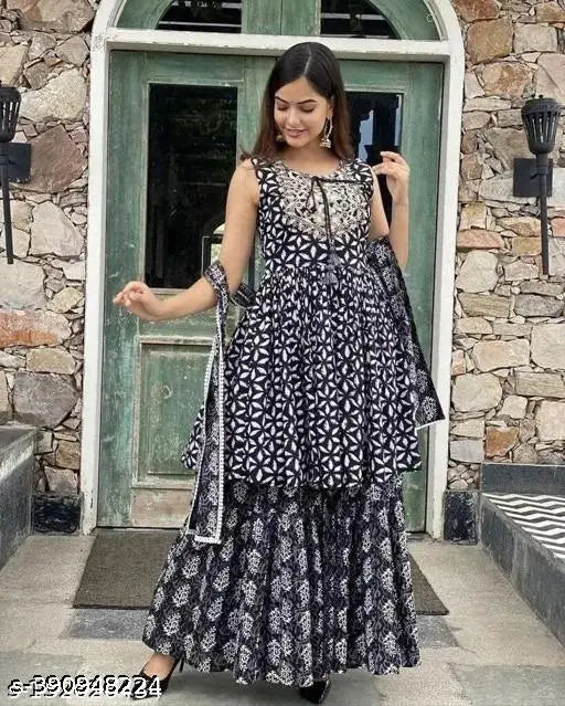 Rayon voguish women's kurta set with sharara & dupatta, printed Indian fashion on display