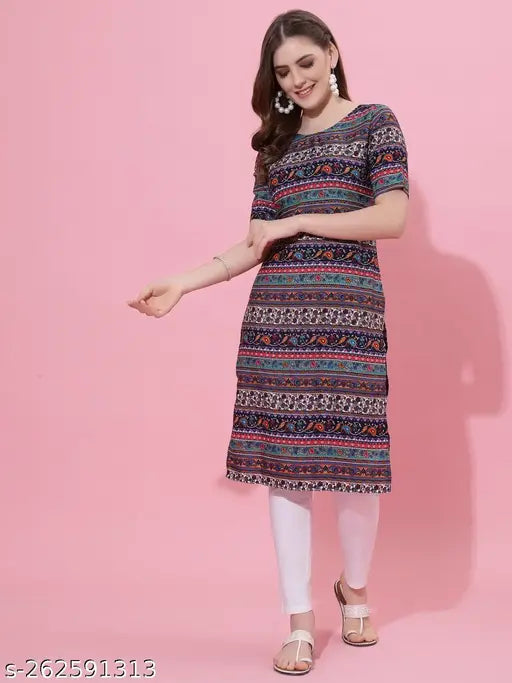 Aqua blue poly crepe kurti with floral mandarin print, suitable for women in sizes XS to XXL. Worn on a model