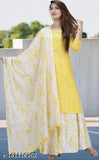 Rayon printed yellow kurti skirt & dupatta set with sharara bottom, three-quarter sleeves. Indian ethnic wear for women, made from rayon fabric. Classic and trendy attire for weddings and occasions. Single size L: Bust 40in, Shoulder 15in, Kurta waist 36in, Kurta hip 44in, Kurta length 46in, Bottom waist 32in, Bottom hip 42in, Bottom length 39in, Dupatta length 2.25in. Made in India