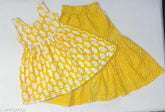 Yellow and pink cotton kurti sharara set for kids (ages 3-10 years), featuring anarkali top with printed or embroidered designs. Perfect for traditional Indian outfits