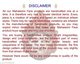 Red polyfibre Mahalakshmi face figurine, 4cm tall for home or office decoration, symbolizing prosperity and wealth