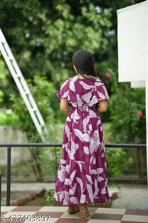 Printed georgette maxi dress with three-quarter sleeves, women's fashion item on a mannequin. (M: bust 38in, length 50in, waist 34in, hip 40in) (XL: bust 42in, length 50in, waist 38in, hip 44in) (XXL: bust 44in, length 50in, waist 40in, hip 46in) (XXXL: bust 46in, length 50in, waist 42in, hip 48in), Indian-made maxi dress