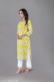 Yellow floral digital print kurti with palazzo, soft rayon fabric, round neckline, three-quarter sleeves. Perfect for various occasions