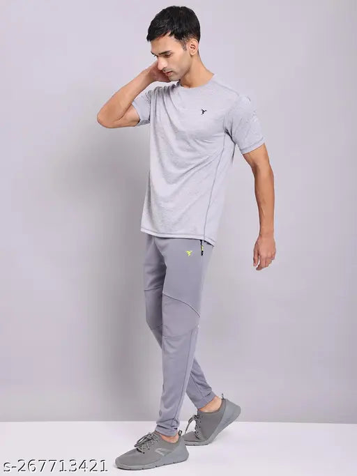 Grey polyester active t-shirt for men, solid round design with rapid dry technology. Men's running t-shirt, comfortable and sweat-wicking. Available sizes S, M, L, XL, XXL. Made in India