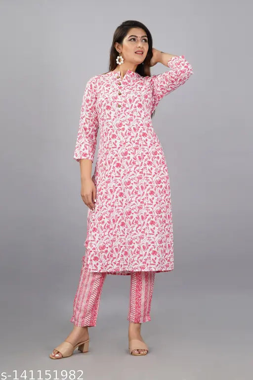 Coral pink rayon contrast print kurti-plazzo set for women's fashion, three-quarter sleeves on display
