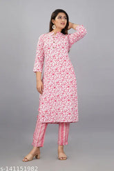 Coral pink rayon contrast print kurti-plazzo set for women's fashion, three-quarter sleeves on display