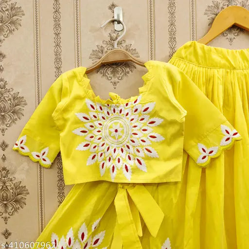 Designer taffeta silk lehenga choli for baby girl: 100% Taffeta Silk, intricate embroidery, mid-calf length, adjustable waistband, breathable lining, delicate trim. Traditional Indian baby girl's outfit for special occasions