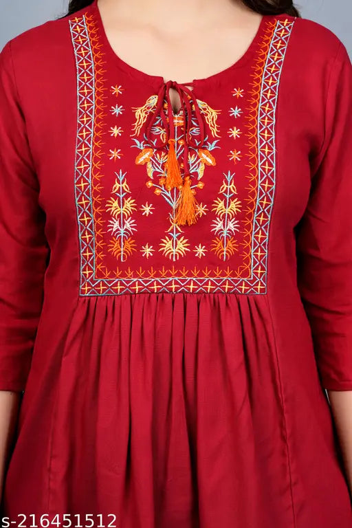 Rayon tunic-and-dhoti set with three-quarter sleeves, embellished Indian attire for women