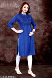 Navy blue denim zigzag design kurti with three-quarter sleeves, featuring embroidered details. Made in India, available in various sizes from M to 6XL