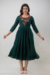Green rayon embroidery Anarkali kurta with three-quarter sleeves, traditional Indian fashion on mannequin