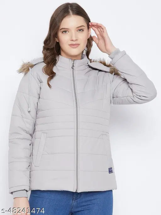 Grey polyester women's parka jacket, solid design with detachable faux fur hood, quilted with quality polyfill fiber, featuring 3 pockets (inside and outside) for winter wear