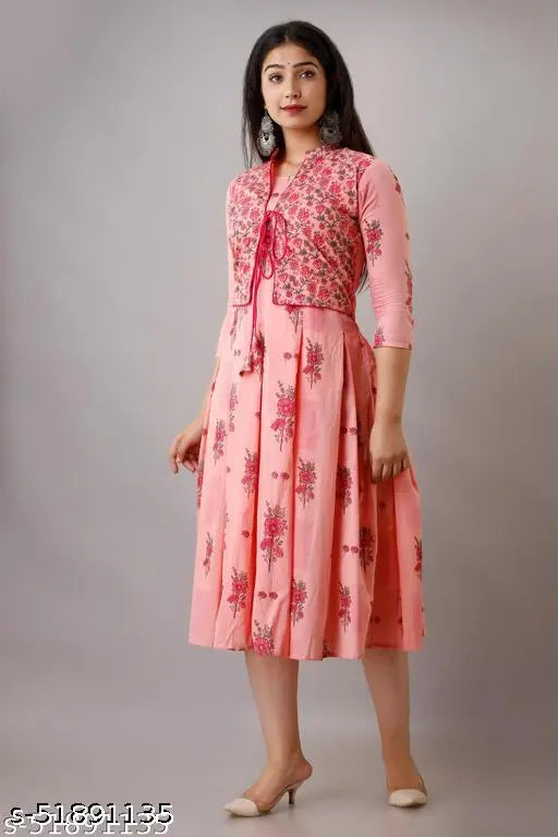 Pink cotton flared kurta with floral print, three-quarter sleeves, size S-XXXL. Indo-western outfit on model wearing accessories